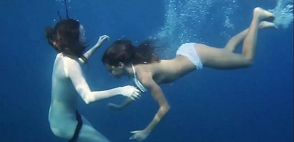  Naked girls on Tenerife having fun in the water